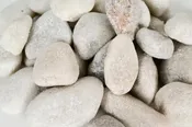 Saco de piedras calcárea rodada blancas 20 kg 20 y 40 mm