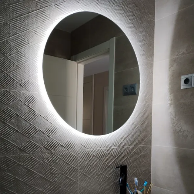 Reforma de baño con cambio a espejo con luz led incorporada