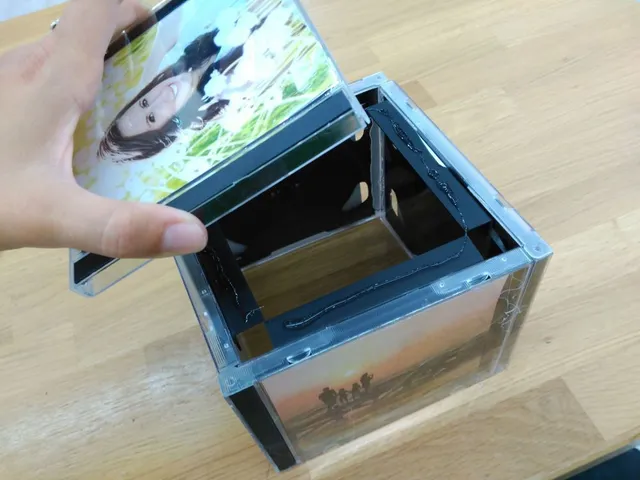 portafotos-cajas-cd-mesa.jpg