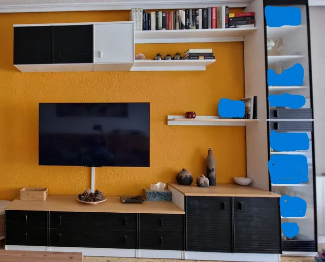 Renovación de un mueble de salón: de negro a blanco para ganar luminosidad