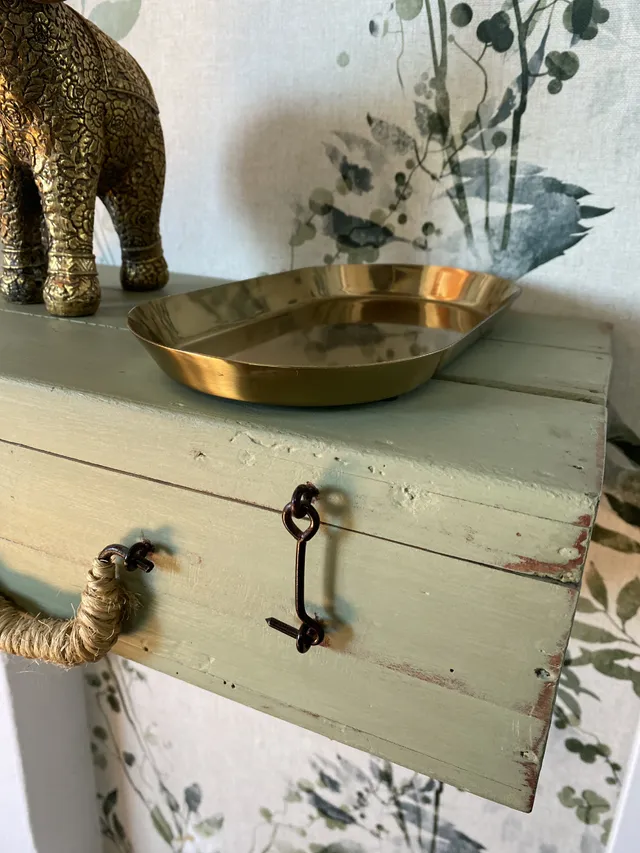 Recibidor hecho de maleta