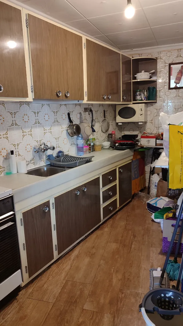 Convertir la vieja cocina en un baño completo