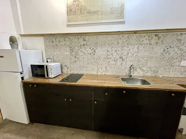 Reforma de cocina: encimera de Madera y cerámica