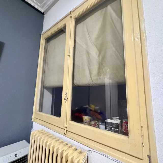 Aislamiento de ventanas antiguas con película térmica